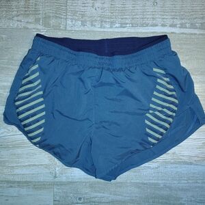 Nike Women's Athletic Shorts in Blue with Yellow Accents